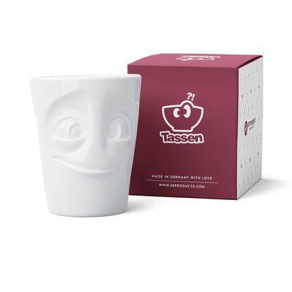 FIFTYEIGHT Products Maximug READY extra-large 16.9oz white porcelain mug with handle. Features wide-eyed eager READY face expression. Premium German porcelain, dishwasher-safe. Made in Germany, perfect for oversized coffee.