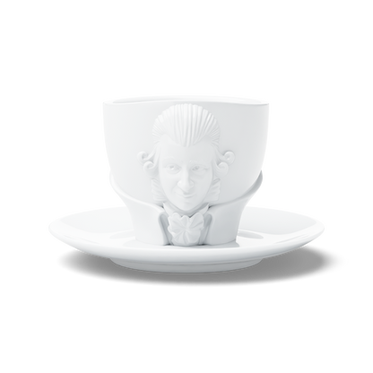 Premium porcelain coffee cup with saucer in white with sculpted Wolfgang Amadeus Mozart face. Dishwasher and microwave safe cup at 8.7 oz capacity. From the TALENT product family of cups dedicated to creative geniuses by FIFTYEIGHT Products. Made in Germany according to environmental standards.