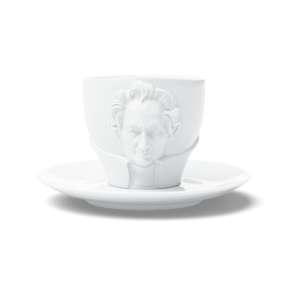 Premium porcelain coffee cup with saucer in white with sculpted Johann Wolfgang von Goethe face. Dishwasher and microwave safe cup at 8.7 oz capacity. From the TALENT product family of cups dedicated to creative geniuses by FIFTYEIGHT Products. Made in Germany according to environmental standards.