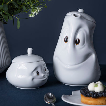 Premium porcelain sugar bowl with "sweet" facial expression and 13.5 oz capacity. Special edition with colorful eyes. Serves sugar, salsa, marmalade, jam, honey, mustard, ketchup, parmesan cheese. Spoon not included. From the porcelain product family of fun dishware by FIFTYEIGHT Products. Shipped in exclusively designed gift box.